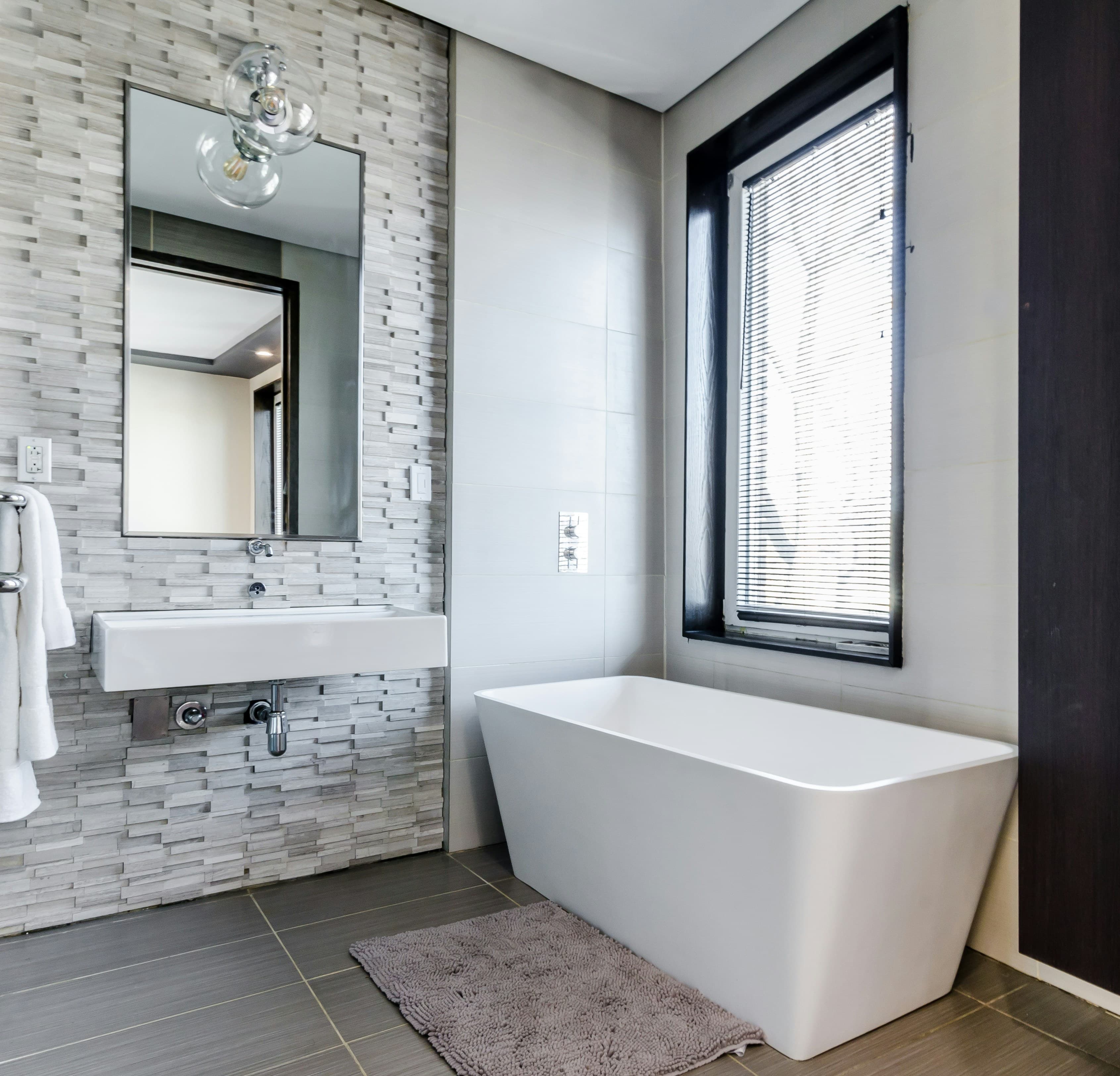 Spa-inspired master bathroom with freestanding tub